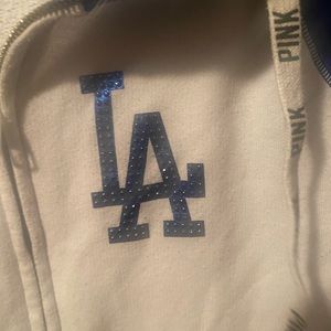 Pink VS secret zip up sweater used in good condition